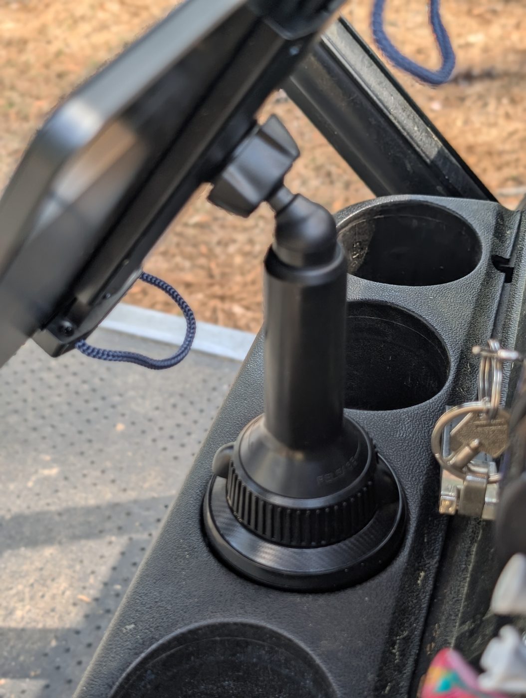 APP2CAR-style cup holder tablet mount in golf cart
