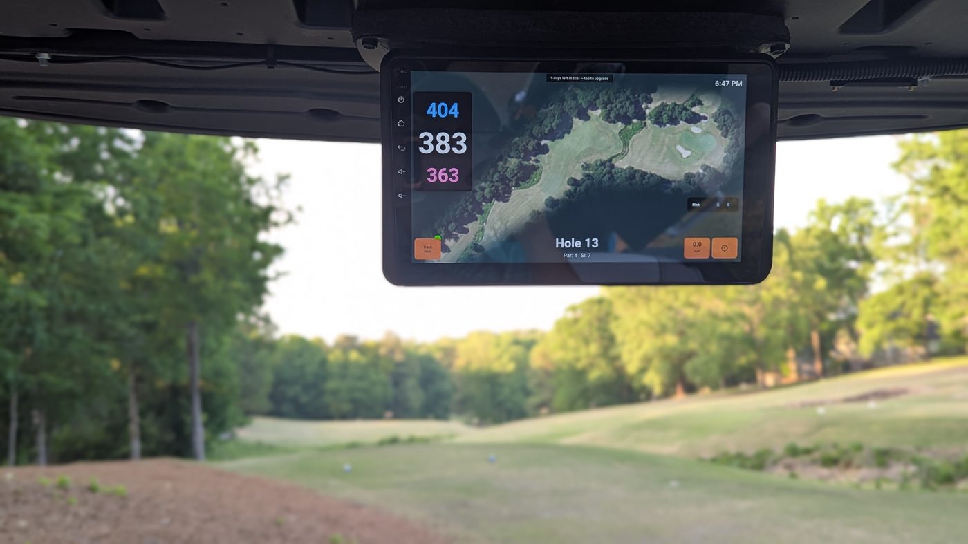 Tablet running Aimy mounted in a golf cart on the course